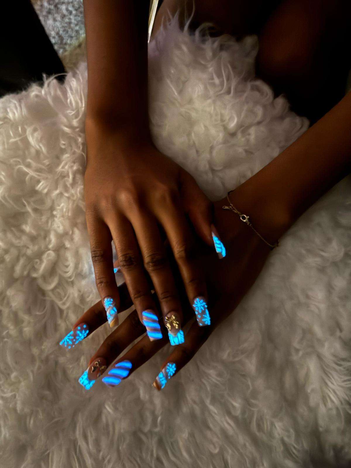Glow-in-the-dark blue with snowflakes and charms.